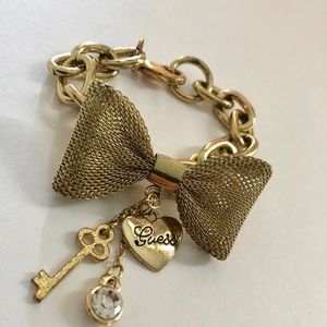 Gold Guess Women's Bow Bracelet